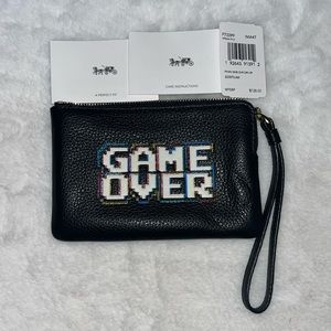 Coach Pac-Man series “Game Over” wristlet NWT